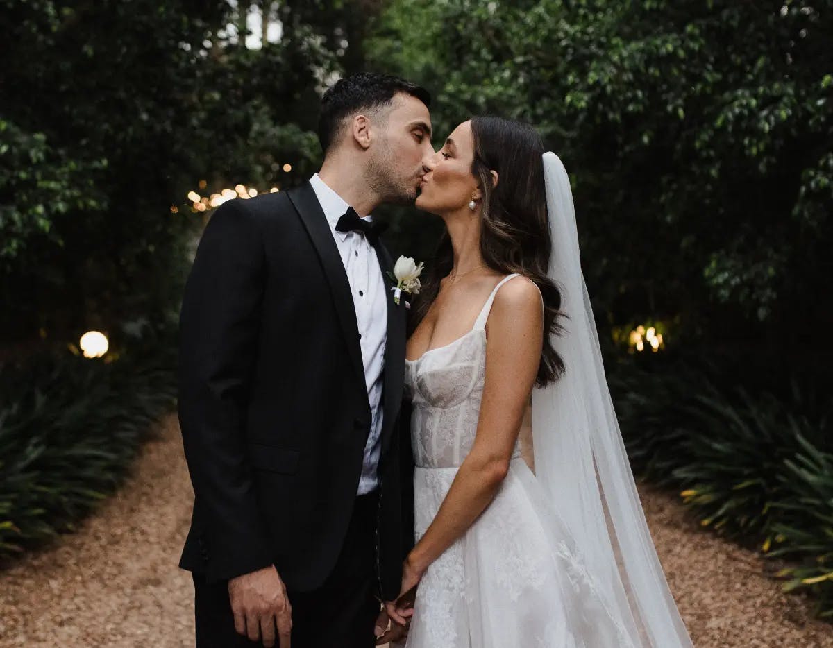 Couple pose on the driveway