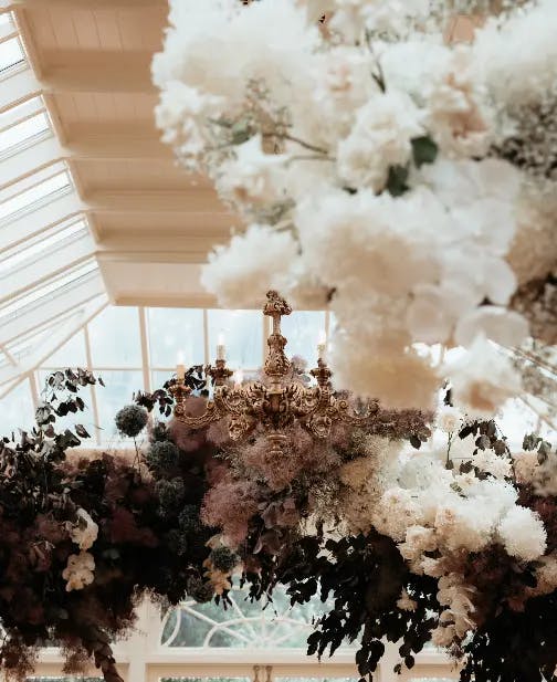 a close-up of the beautiful wedding flowers decorating the space at gabbinbar