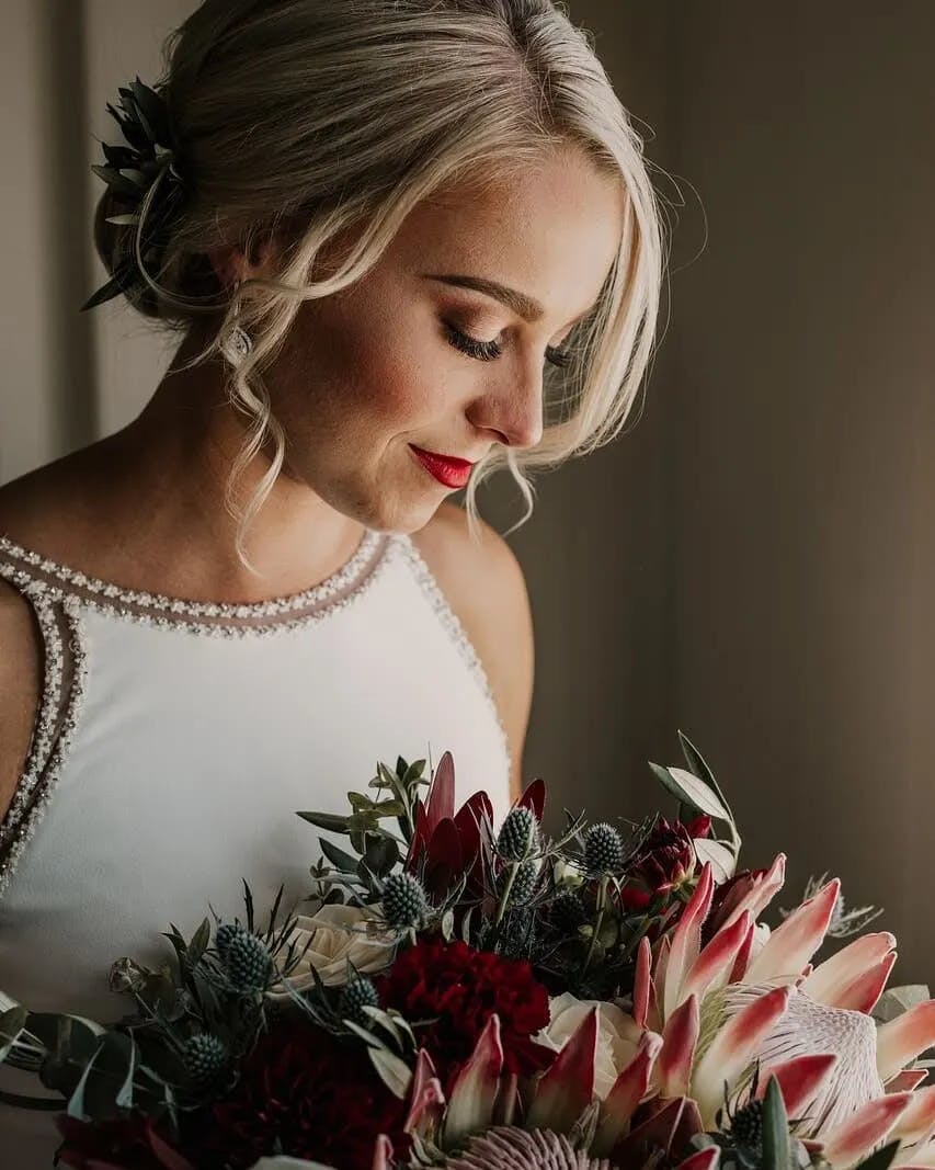 Bride holidng bouquet
