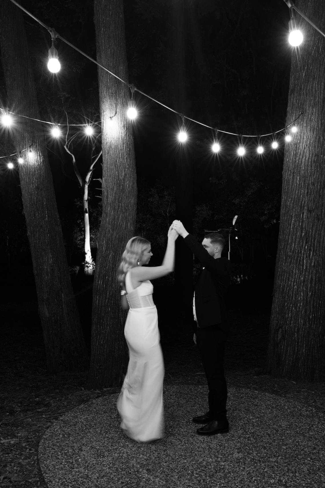 Bride and groom dancing in 'The Woods'