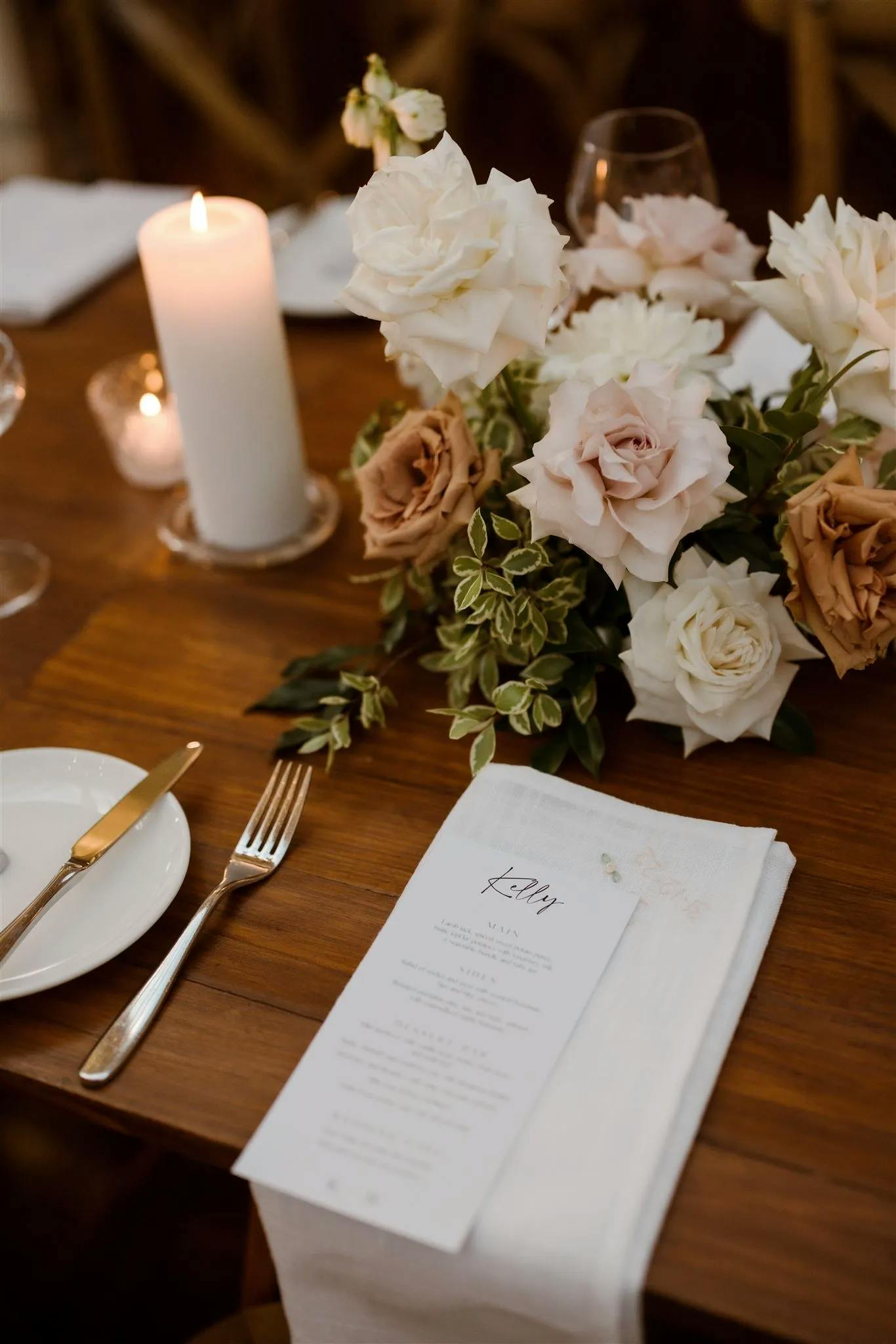 Flowers and cutlery on wedding tables