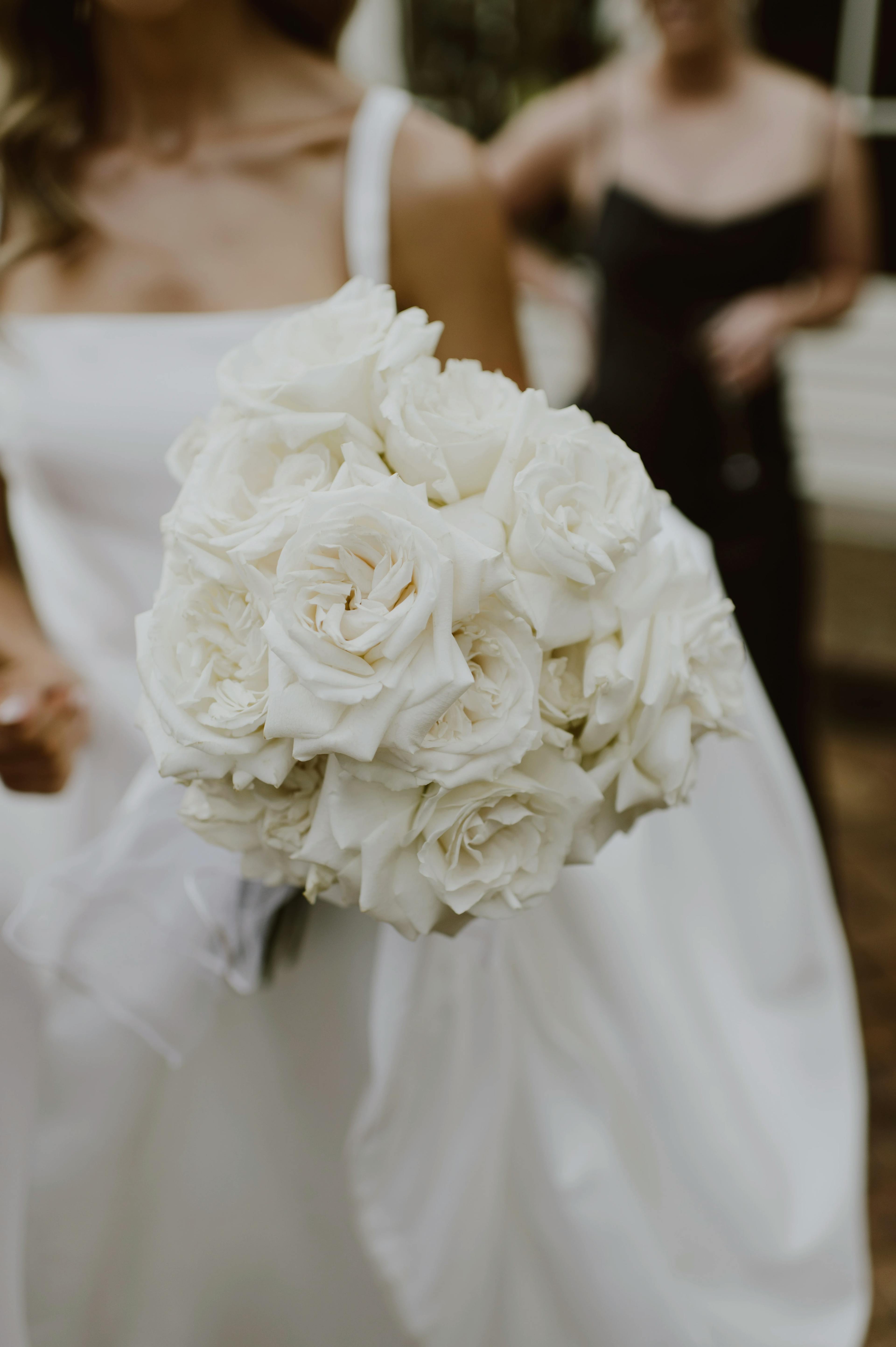 Bride bouquet made of crisp white roses