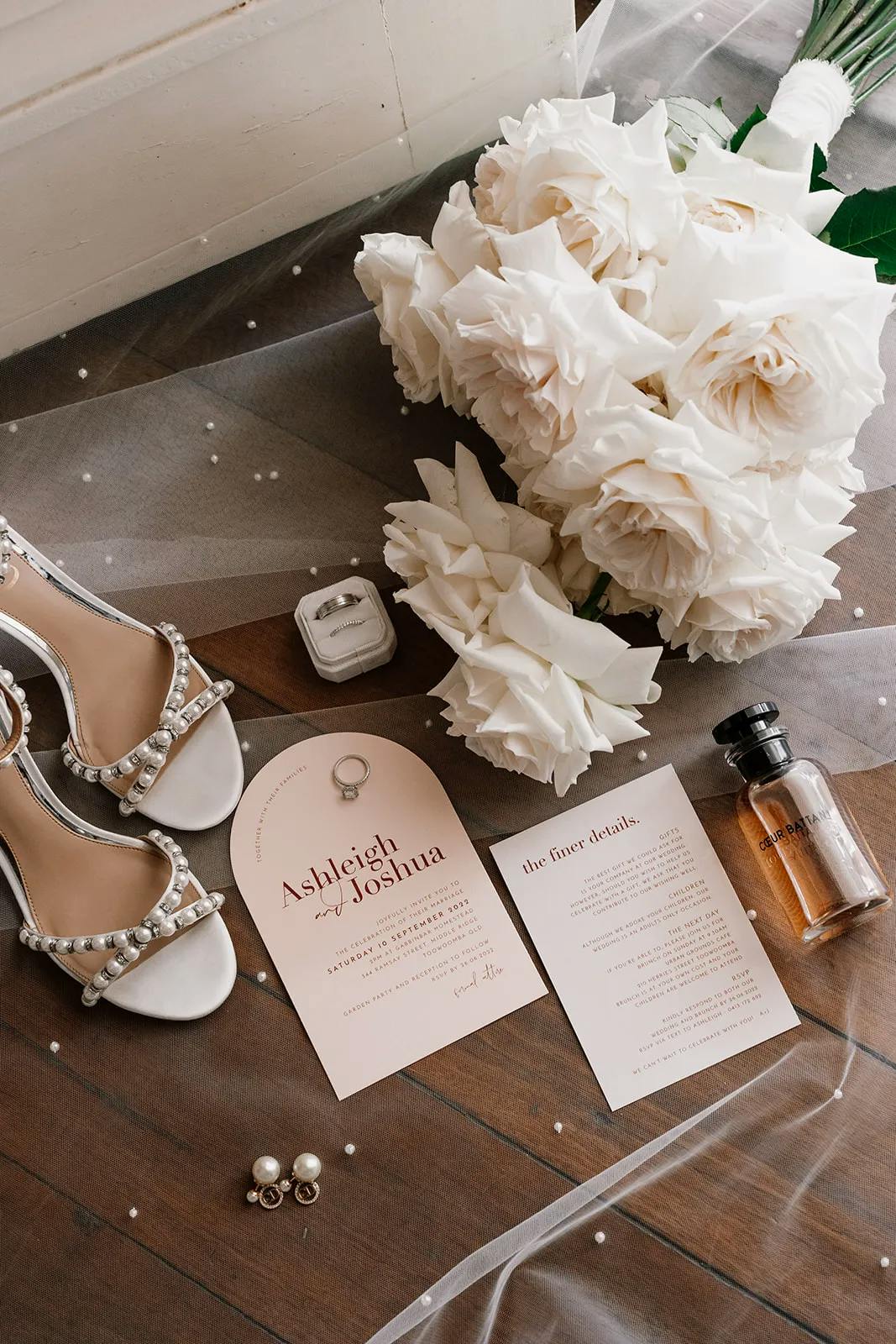 Wedding flowers, perfume and invitation