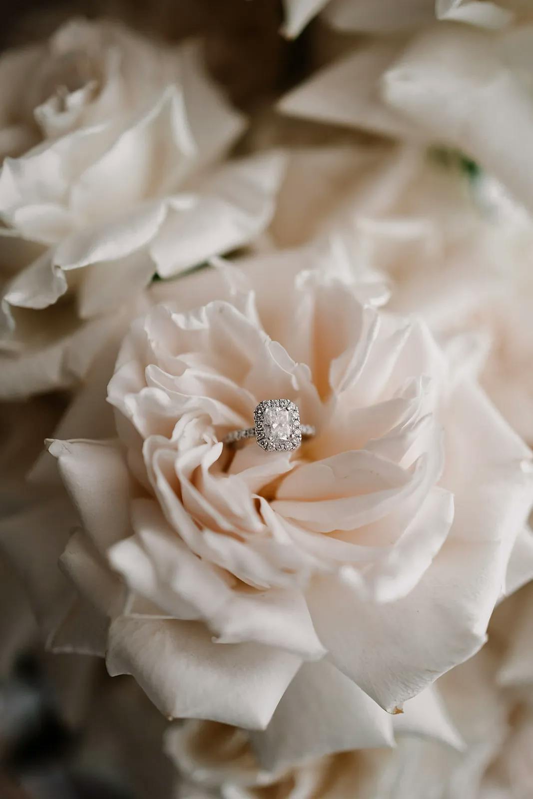 Wedding ring in flowers