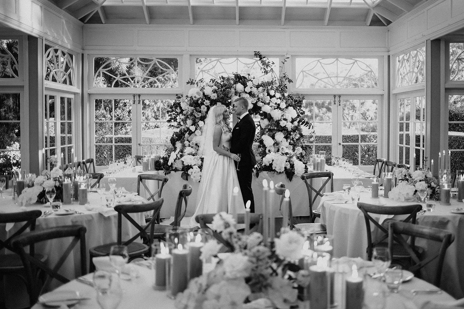 Bride and groom in reception space