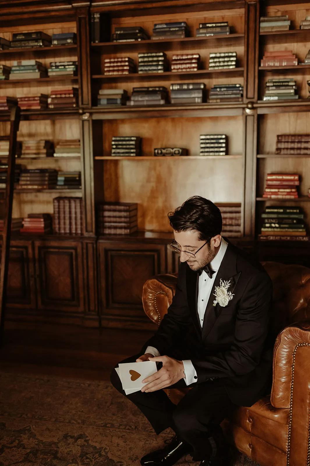 Groom reading card from wife