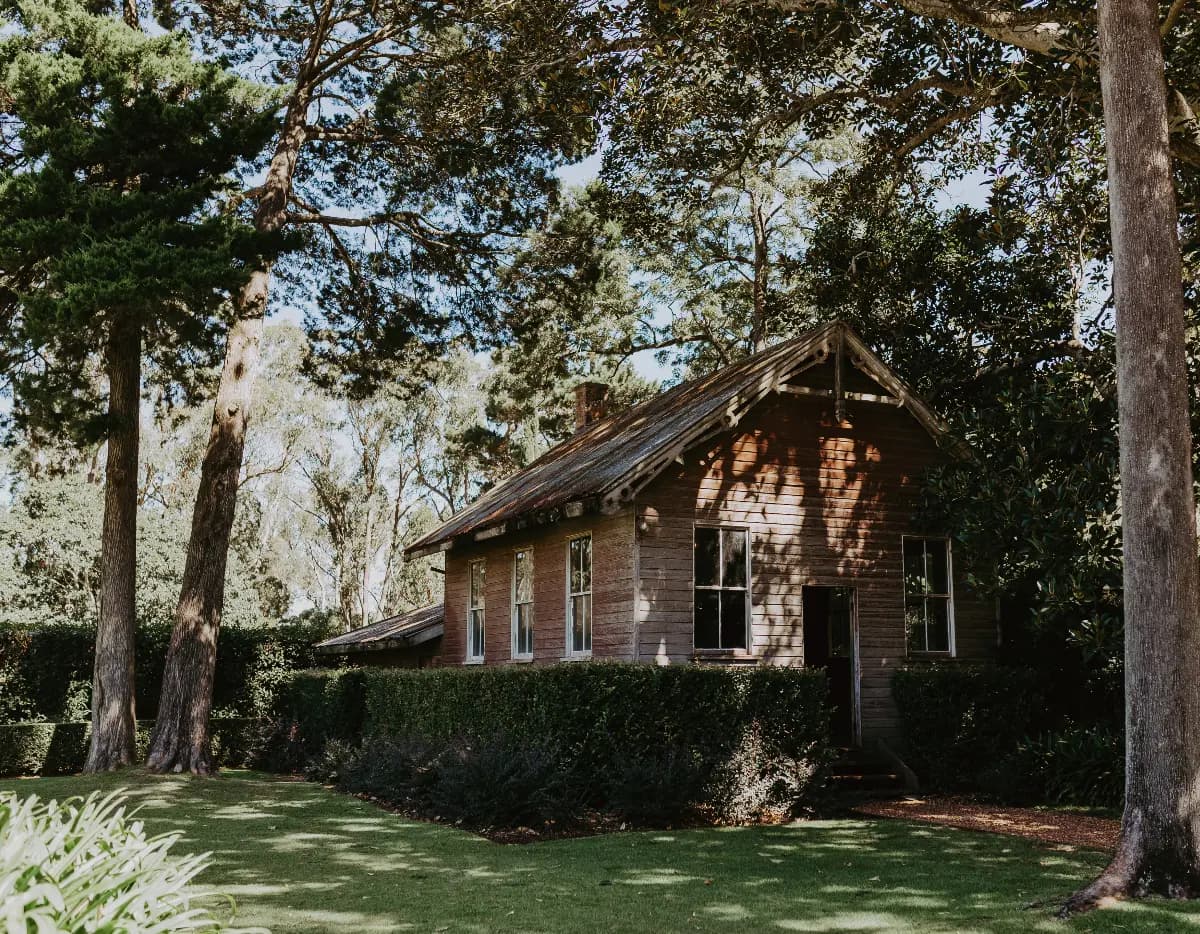 Old School House amongst trees