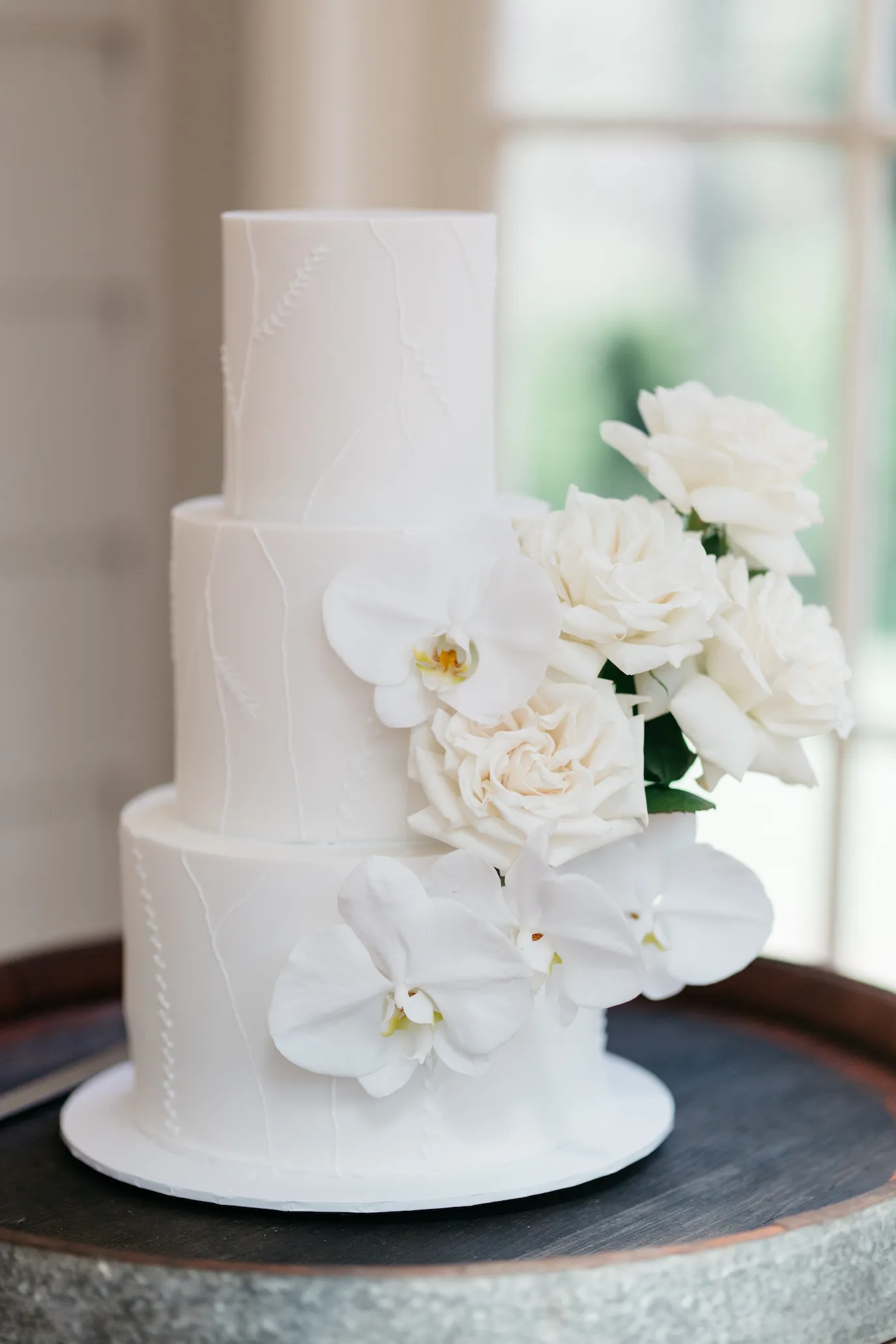 Wedding cake with white orchids
