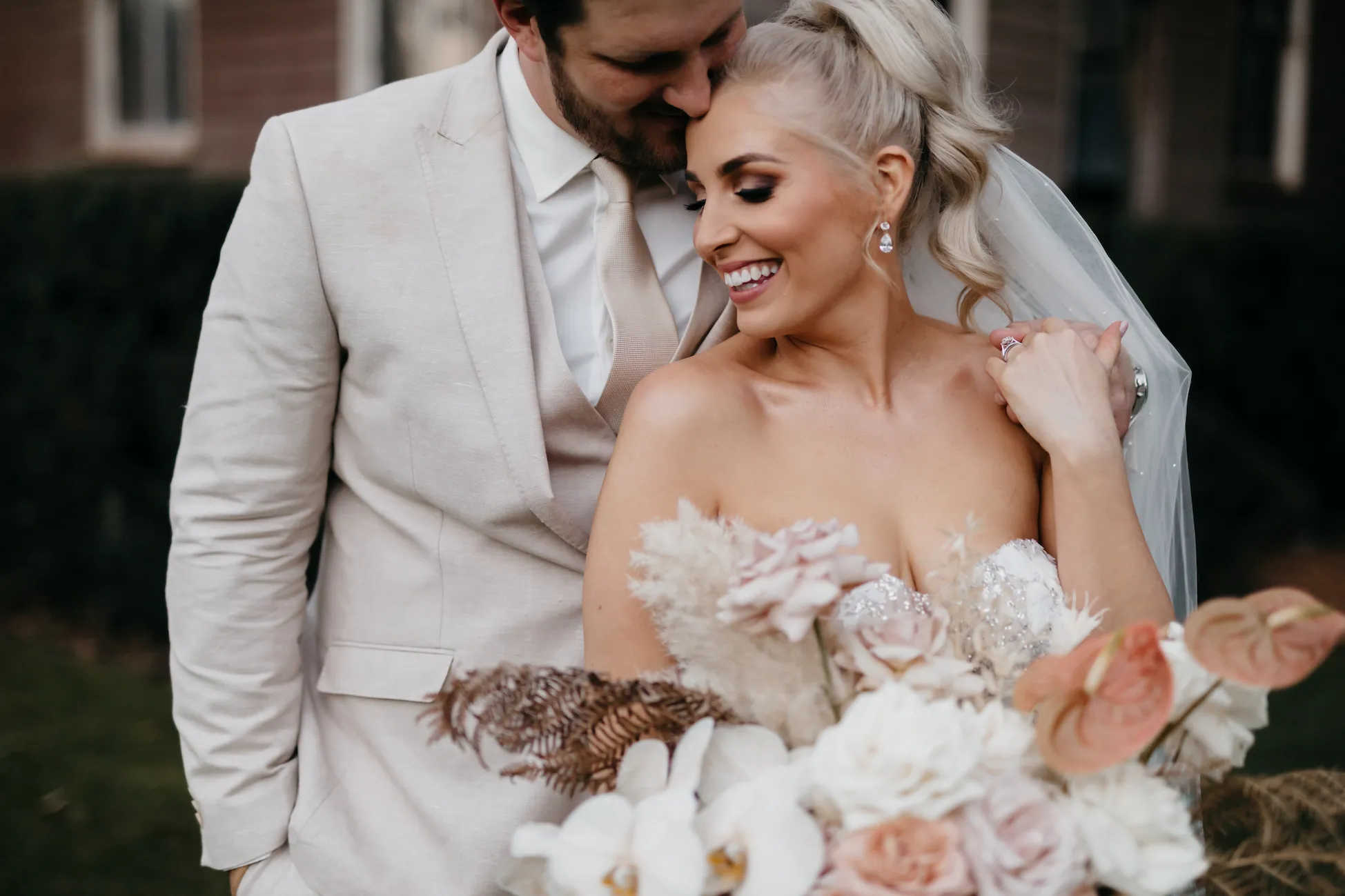 Bride and groom hugging