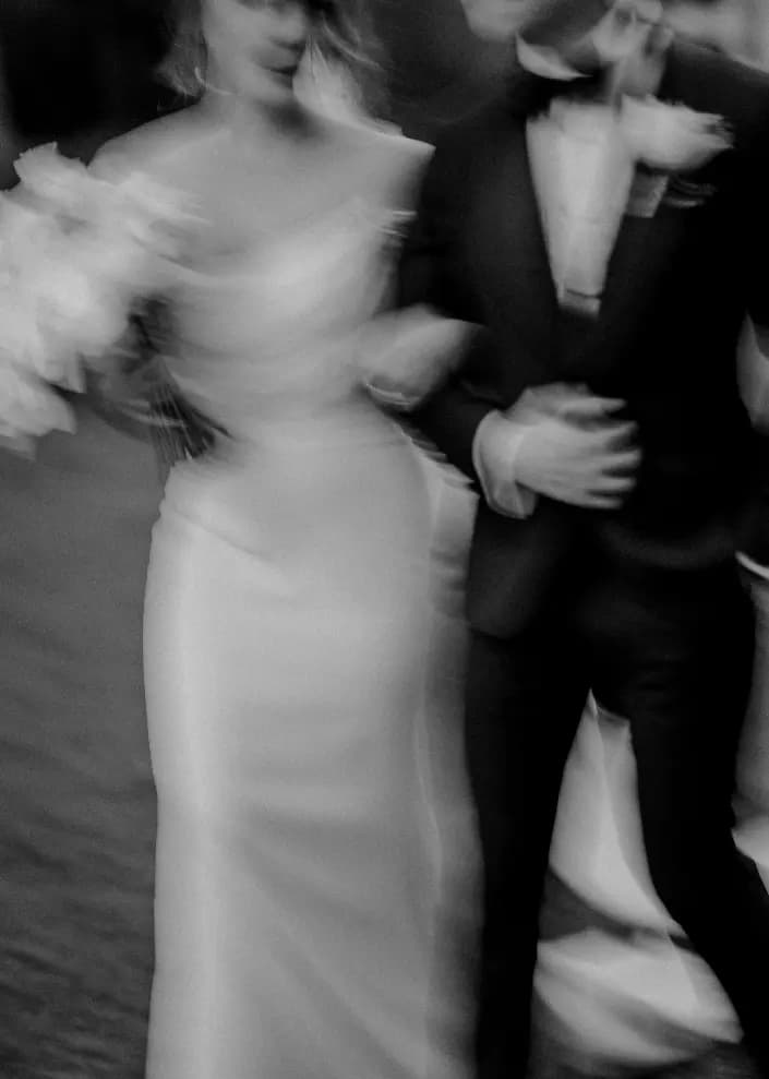 Couple walk in black and white