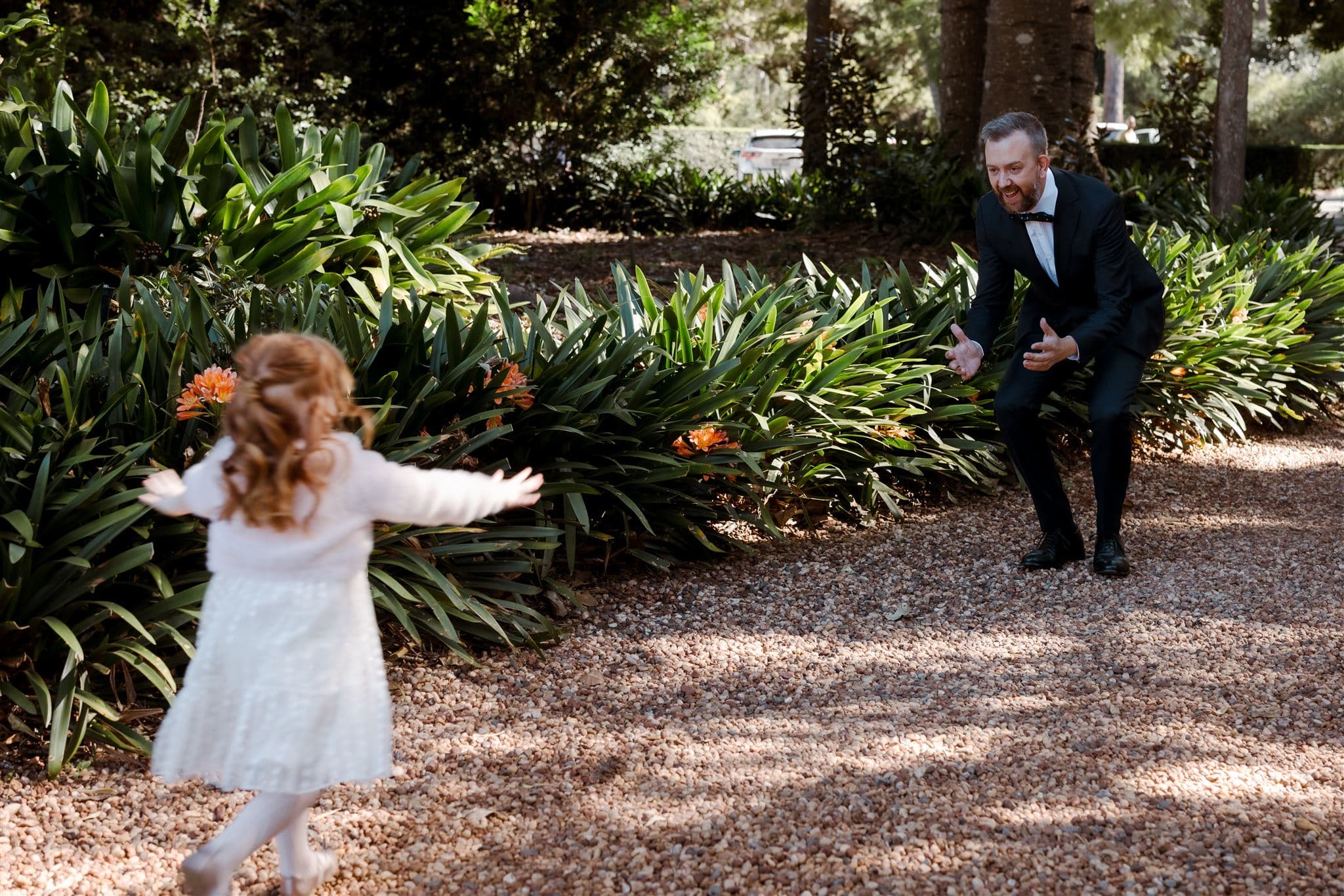 Daughter running towards father