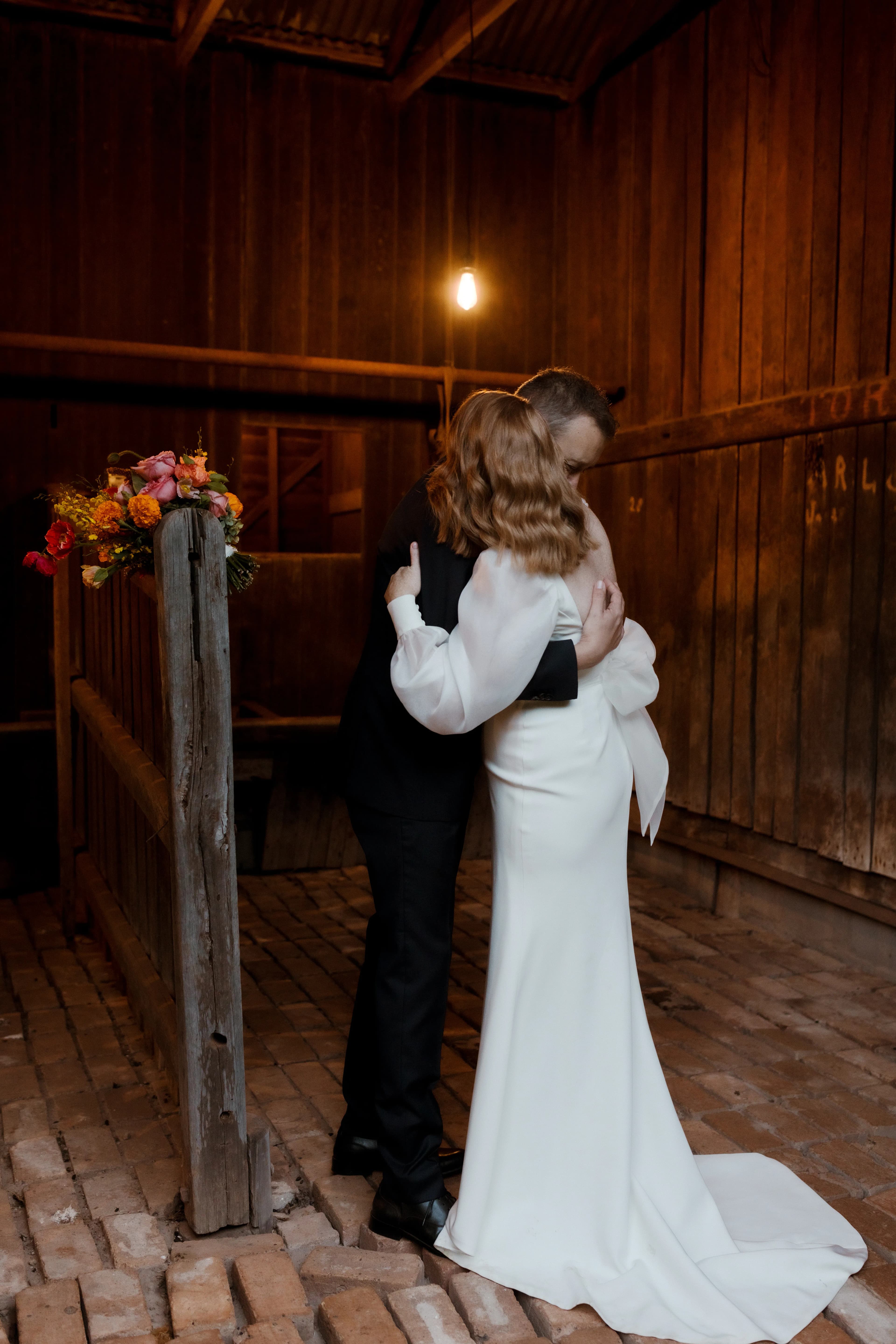 Bride and groom embracing