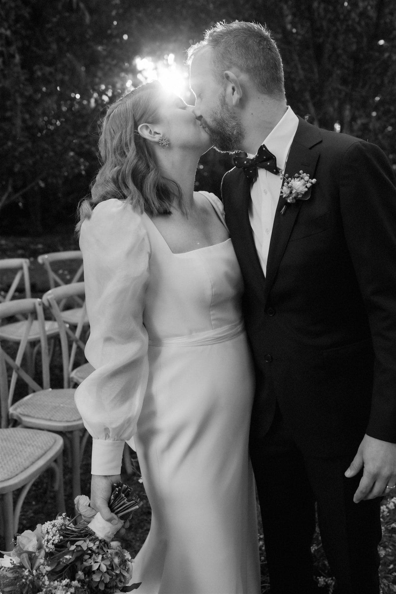 Bride and groom kissing