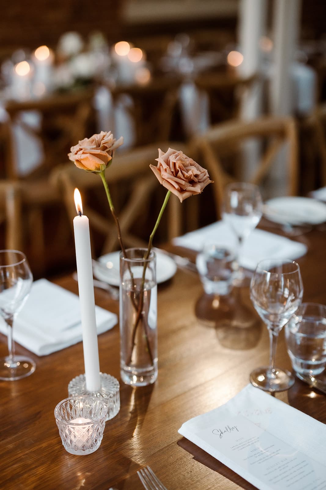 Flowers in vase on wedding table