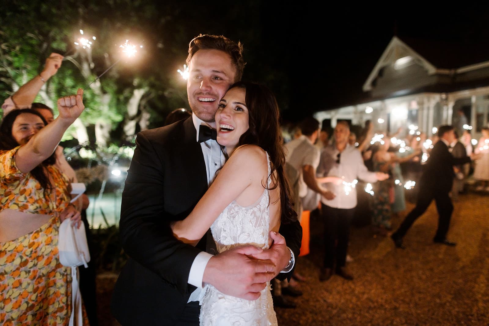 Bride and groom embracing